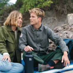 Klean Kanteen Insulated TK Wide With Café Cap 1900ml - Black -Klean Kanten Shop K64TKWSSL SB insulated botttle couple beach lifestyle